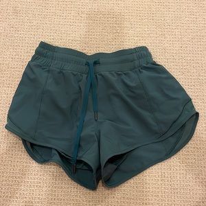 CRZ YOGA Women's Mid-Waist Workout Running Shorts Mesh Liner - 2.5"